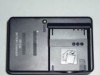 Зарядное устройство Panasonic DE-A40B для аккумуляторов Panasonic S008, VBJ-10, DMW-BCE10